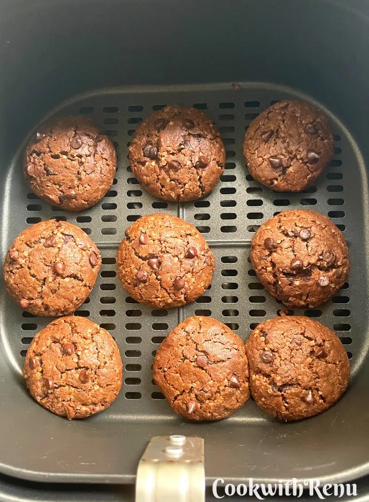 Air Fryer basket with baked Double Chocolate Chip Cookies.