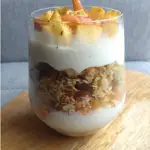 Apple Granola Overnight Oats served in a glass.