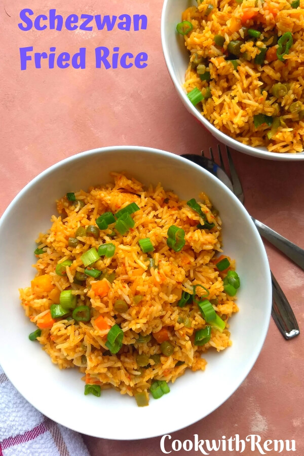 Veg Schezwan Fried Rice is an Indo chinese dish where the rice is cooked along with spicy schezwan sauce, soya sauce, vinegar and and loads of vegetables.