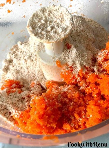 Wholemeal Flour and grated carrot to be combined