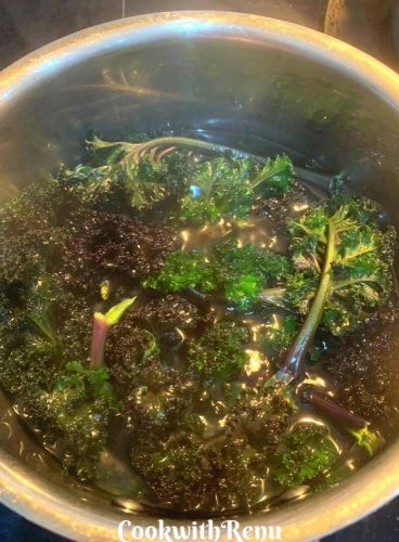 Blanching of Kale, dipped in hot boiling water