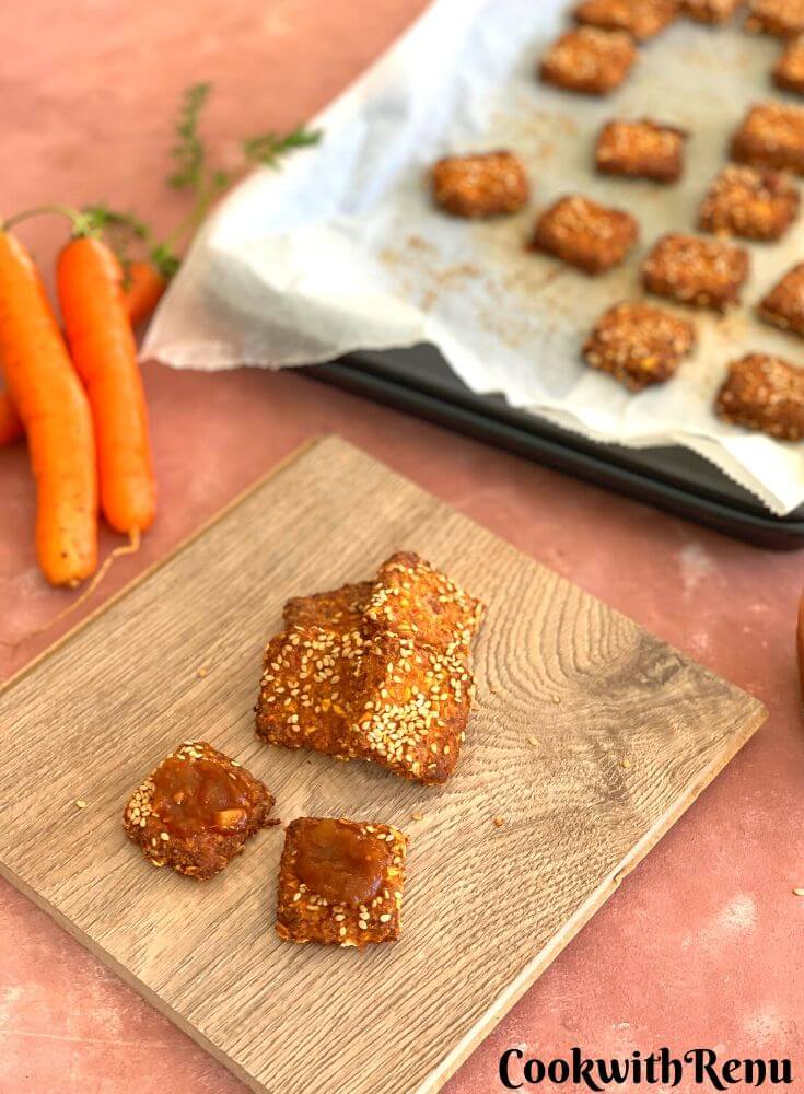 Wholemeal and Oats Carrot Crackers are quick and easy eggless and sugar free crackers made in a jiffy using healthy ingredients like Carrot, Gluten Free Oats and Wholemeal flour. They are loaded with superfoods like chia and sesame seeds for health conscious people and has some cheese to please little ones. They are free from any leavening agent that is they do not have any baking powder or baking soda.