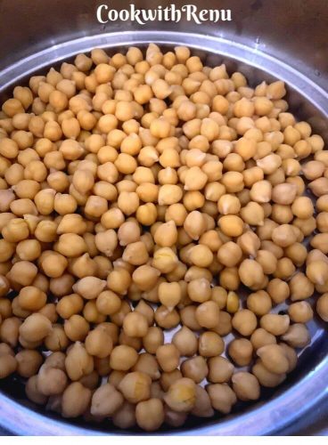 Cooked Chickpeas on a strainer to drain any excess water and let it dry a bit