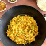 Daliya & Split Green Moong Dal Khichdi presented along with Homemade Aloo Papad and Yogurt