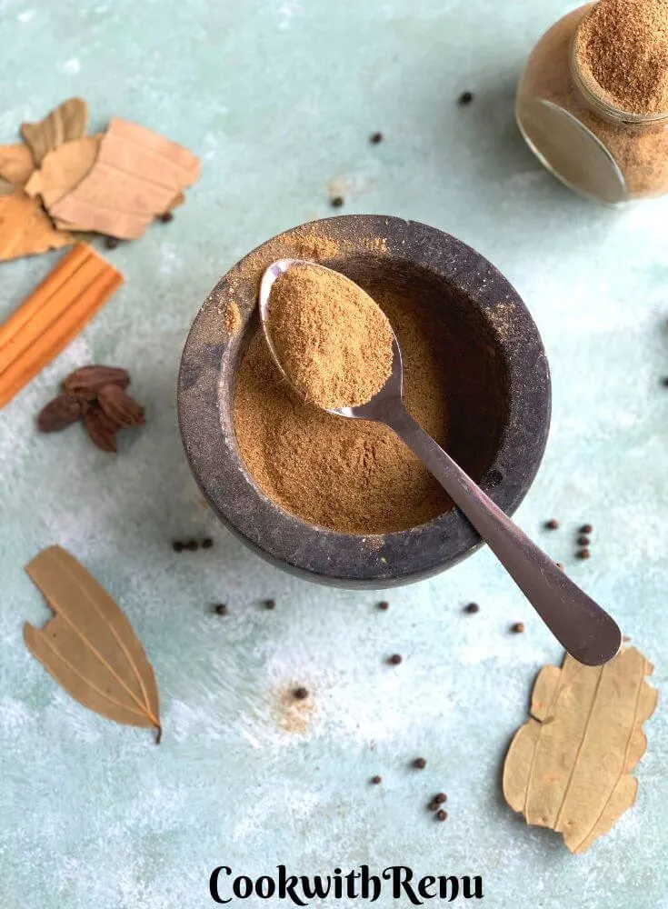 Another view of Garam Masala presented in a mortar pestle with whole spices