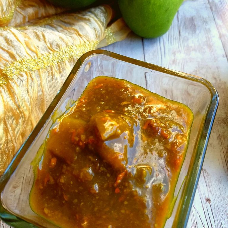 Close up look of Sweet & Sour Mango chutney, with tangy mango pieces clearly seen