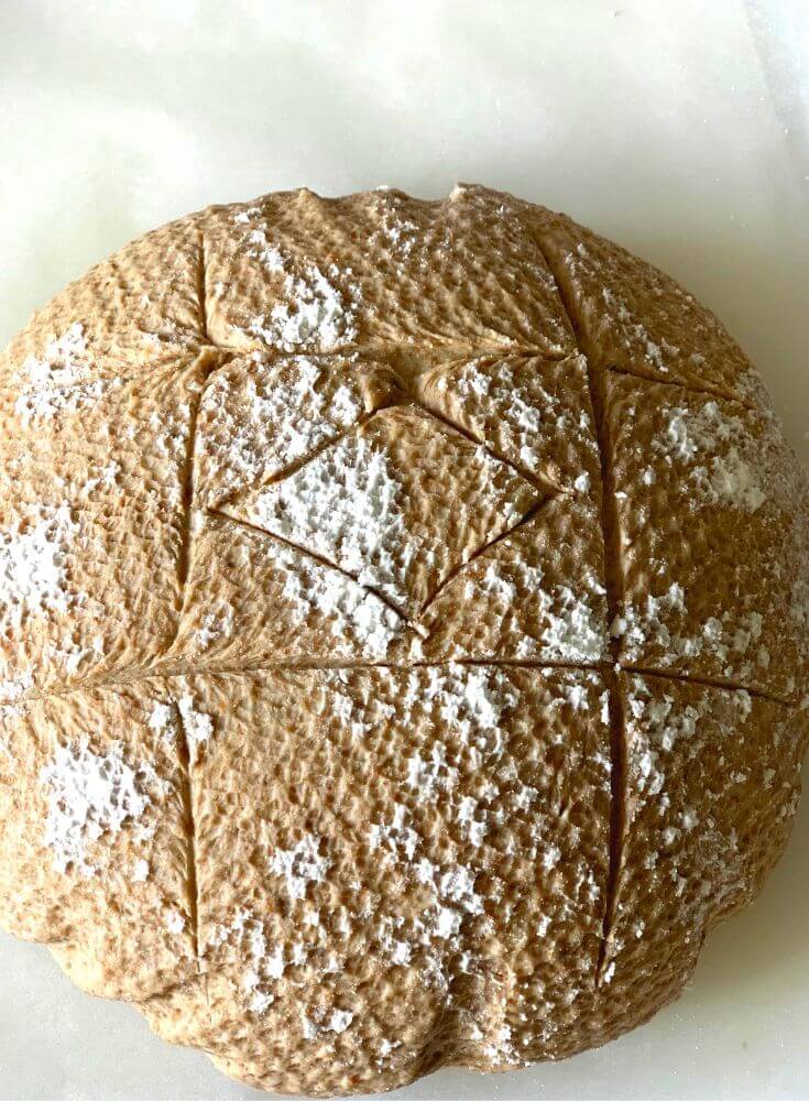 Dough Scored with a knife. Beautiful pattern has imprinted due to the napkin