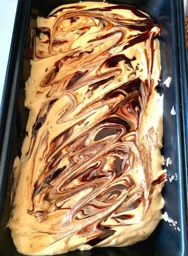 The Final Top Layer of Ice Cream with Chocolate Drizzle