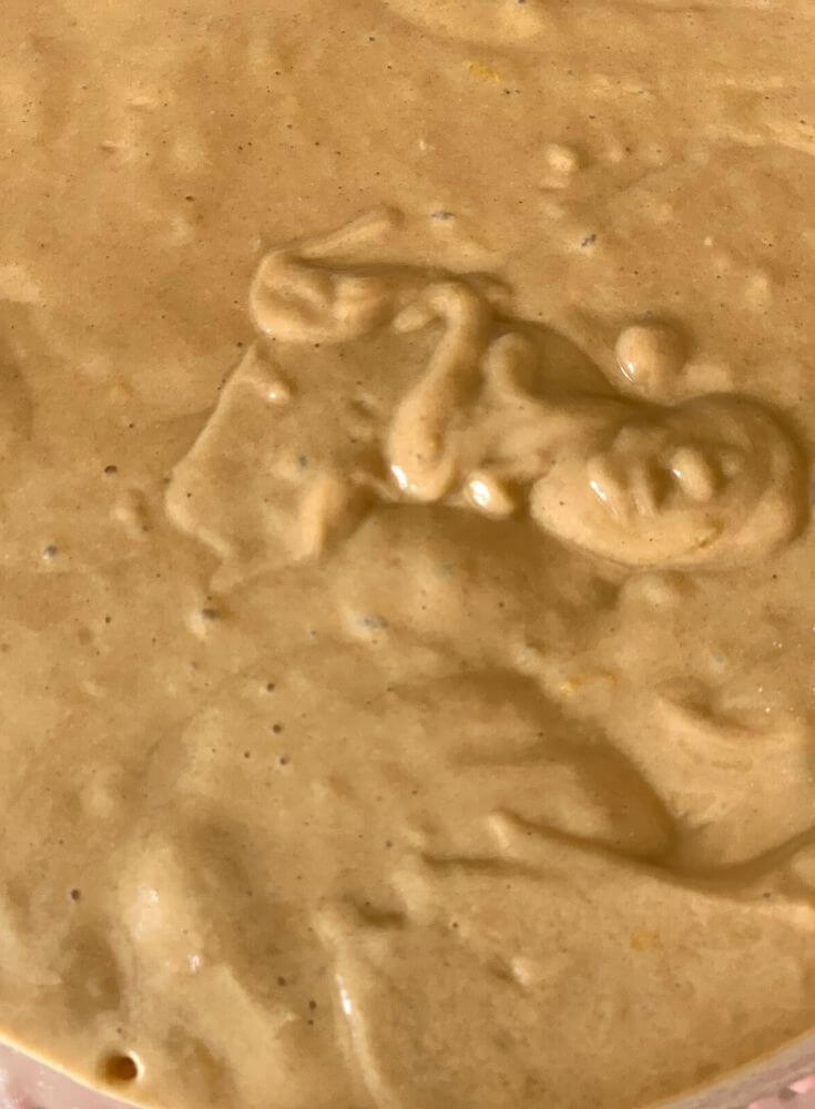 Mixing of the wet into the dry, the smooth batter