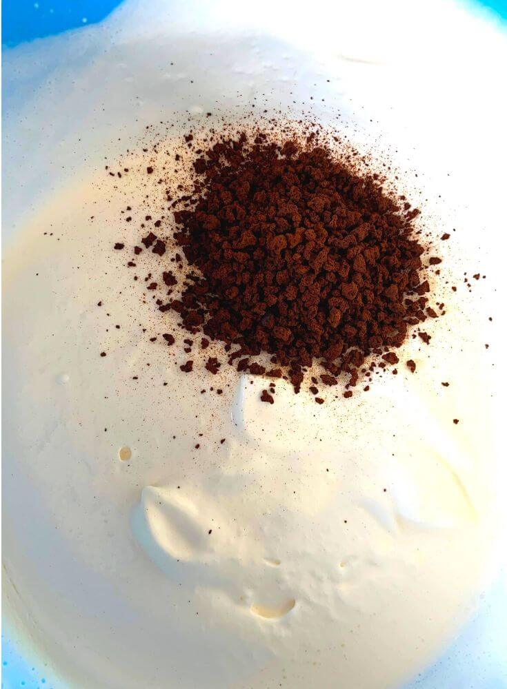 Fresh Cream beaten to semi stiff peaks and Coffee powder added to it