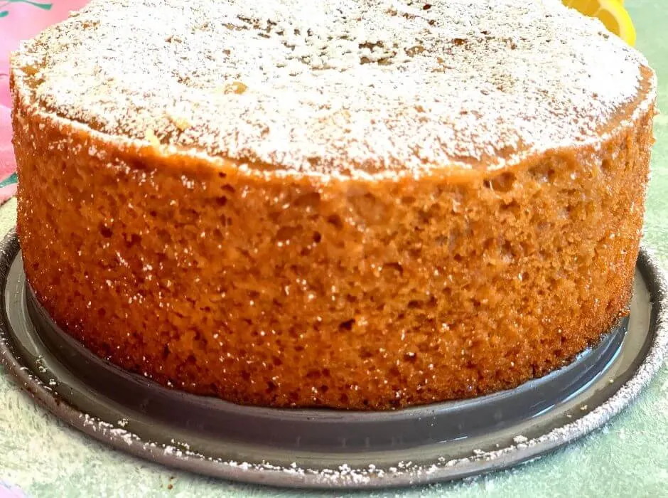 close up look of lemon cake with the outer crumbly and soft texture seen clearly