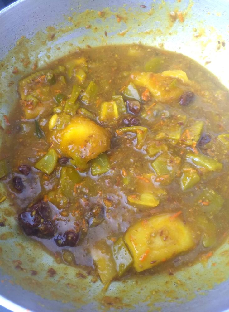 Jaggery being added to Launji