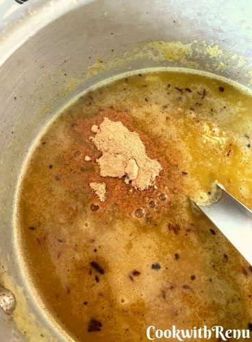 Dry masala's added to the gravy, that is amchur powder and garam masala powder