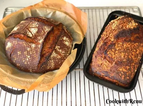 2 Sourdough Breads Just out of the oven. One in Boule shape and other in loaf tin