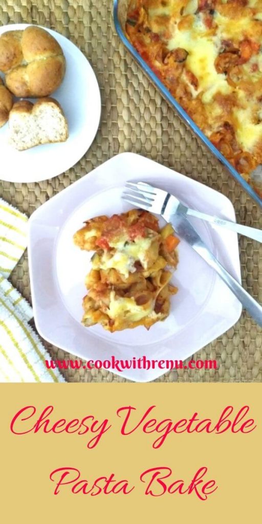 Cheesy Vegetable Pasta bake is a complete one pot meal loaded with Vegetables and bursting with flavours of fresh basil, oregano and oozing and hot cheese.