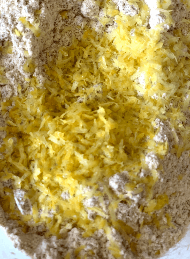 Adding of lemon zest and tutti frutti mix in the dry ingredients