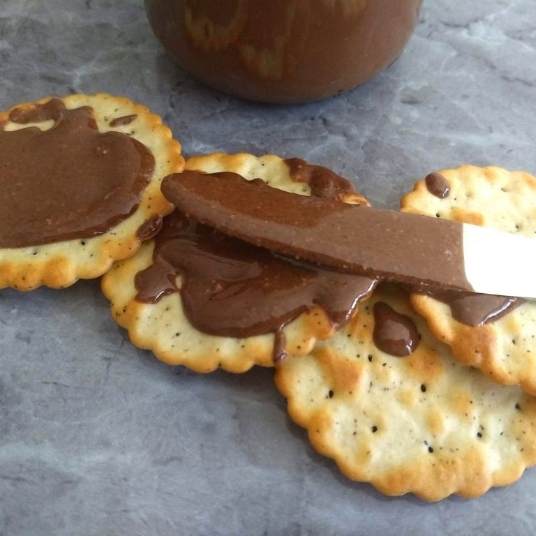 Crackers spread with Sugar-Free Hazelnut Chocolate Butter