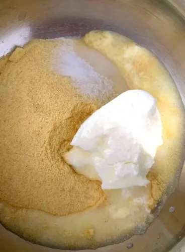 Adding of yogurt and salt in Rava