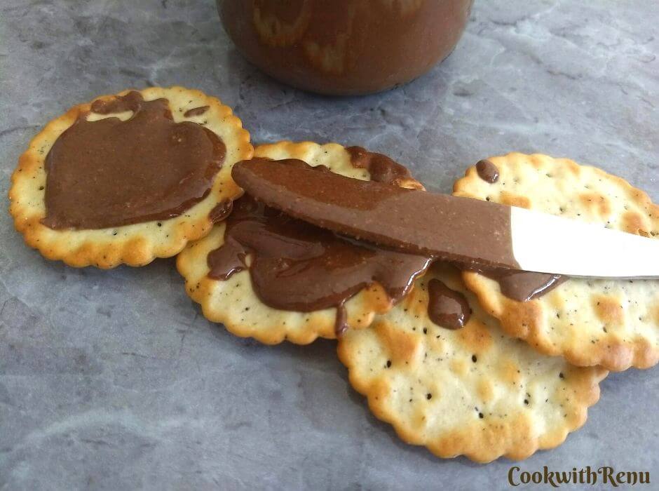 Crackers spread with Sugar-Free Hazelnut Chocolate Butter