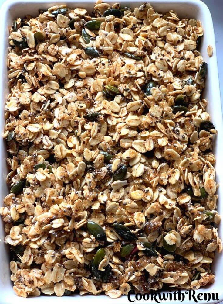 Peaches topped up with the oats mixed, Ready to be baked in the oven