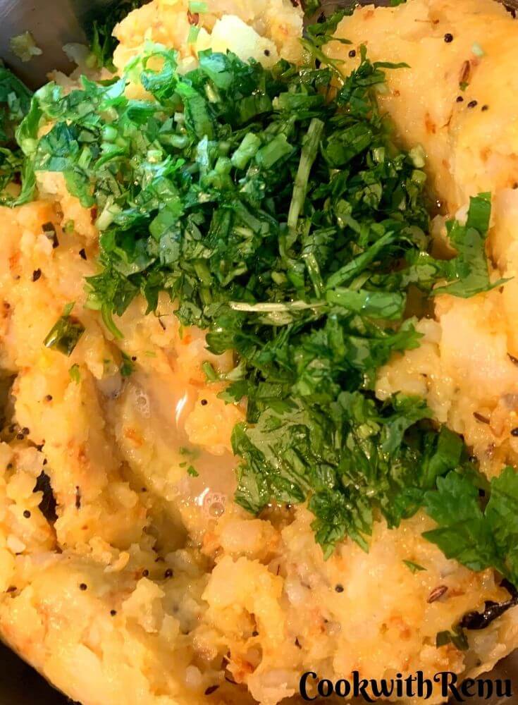 Adding of coriander in the potato mixture
