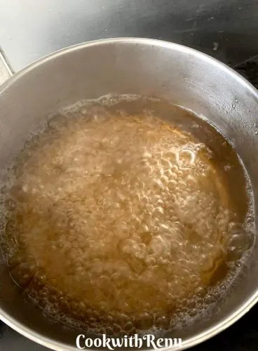 Boiling water in open pan for Rasgulla
