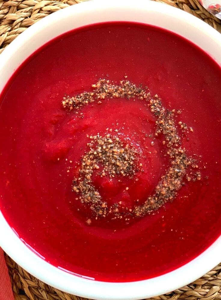 Close up look of Carrot Beetroot and Horse gram sprouts Soup is a comforting, nutritious and a healthy soup.