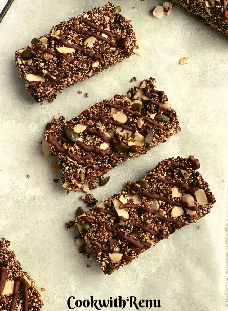3 Chocolate Healthy Amaranth Bars arranged on a parchment paper