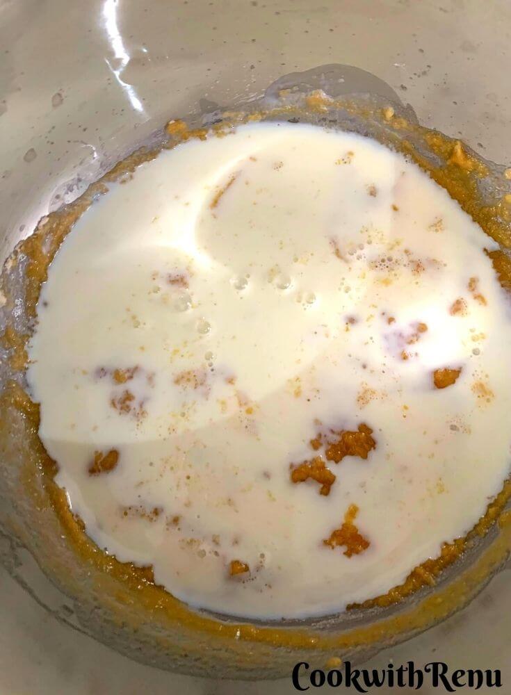 Adding milk in the flour and butter mixture