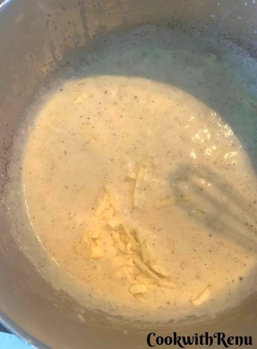Adding cheese in white sauce
