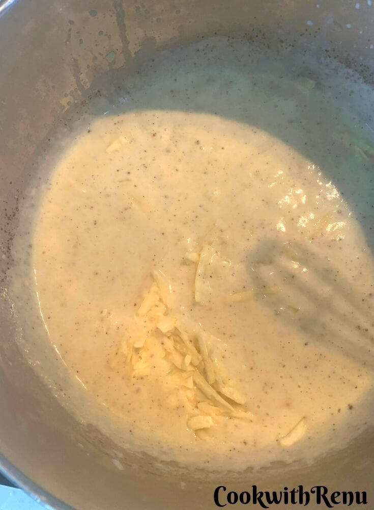 Adding cheese in white sauce