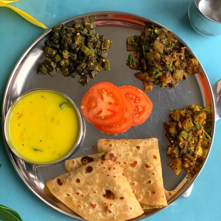 Summer special Vegetarian Thali is a light and refreshing meal that has the summer veggies served along with gluten free and vegan kadhi.