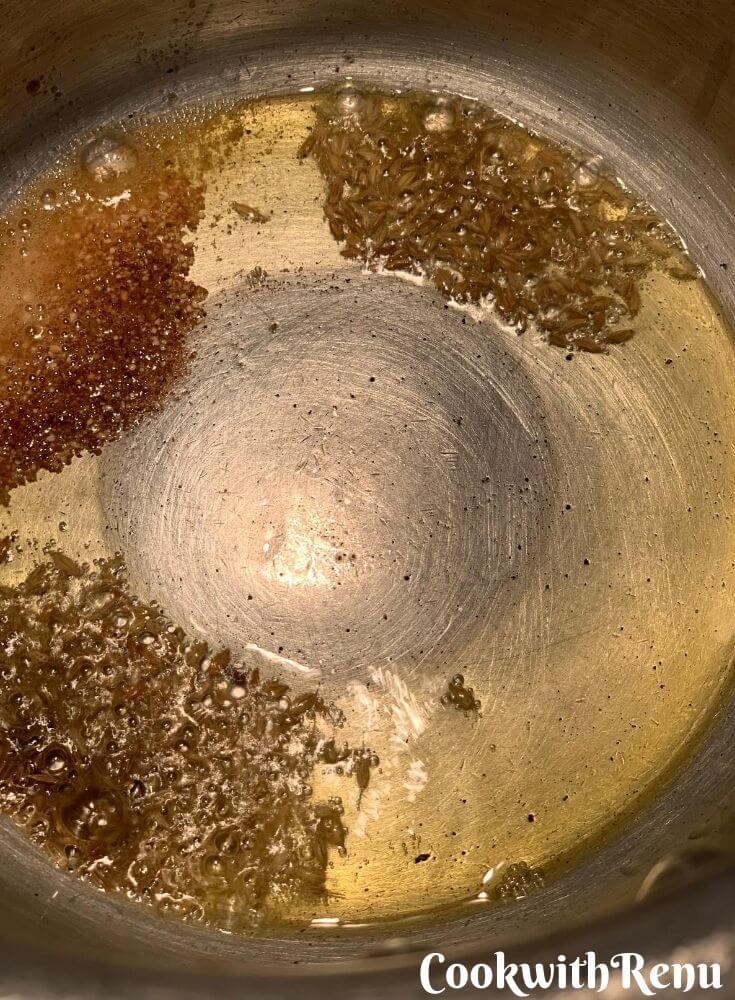 Tadka of Ghee, asafoteida, and cumin