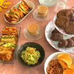 Afternoon Tea Time Platter featuring different types of Vegan Sandwiches, Gluten-Free and nut-free cookies, chips, and dips catering to people with different food groups.