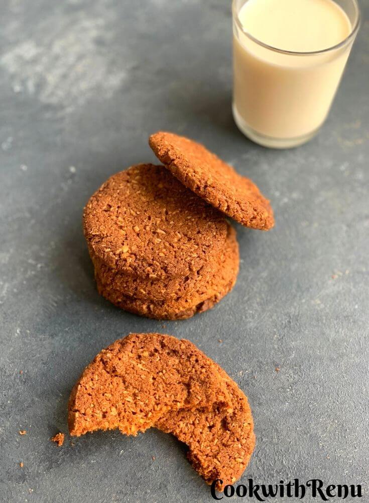 Top view of eggless, gluten-free and nut-free cookies are eggless, gluten-free and nut-free melt in mouth cookies. Crunchy on the outside and soft on inside. They are served along with a glass of milk.