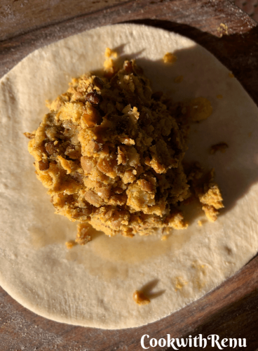 Stuffing of the horse gram dal in paratha