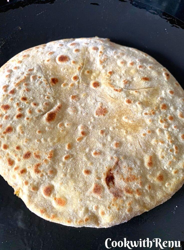 Cooking of the poli on the top side