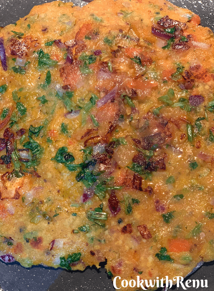 Flatbread being shallow fried on the griddle