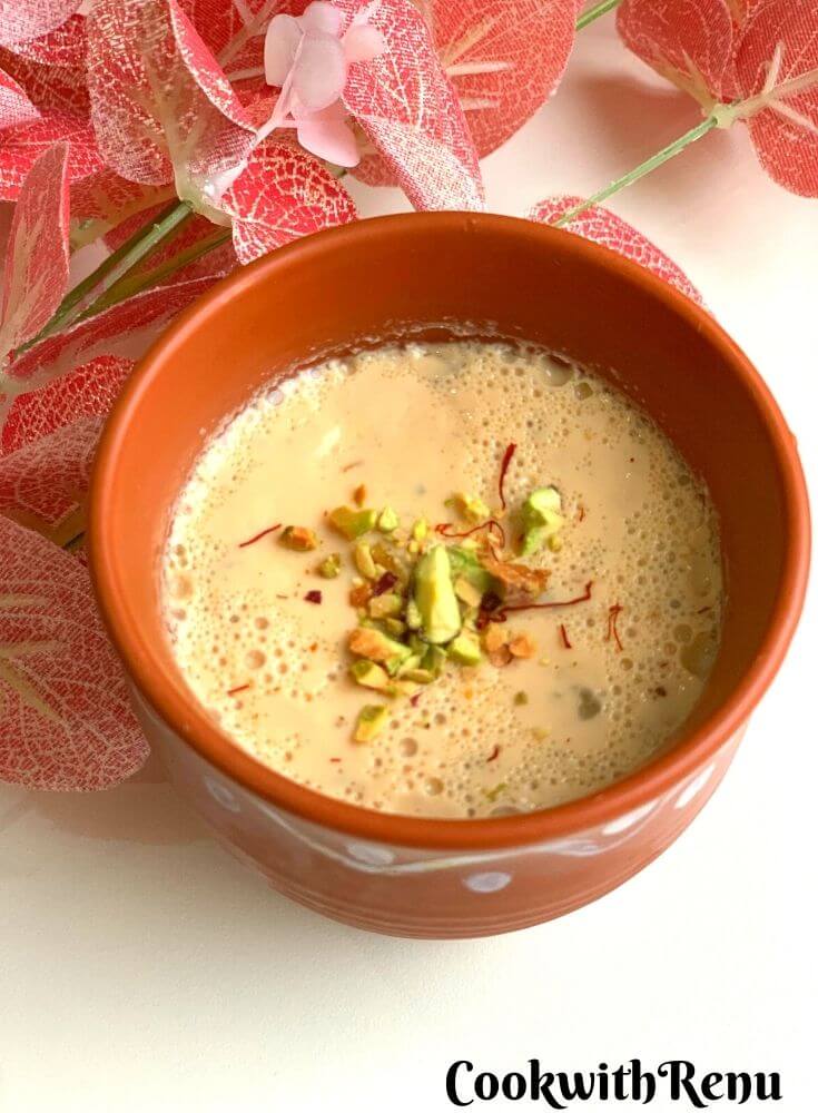 Close up look of Mishti Doi presented in a brown bowl