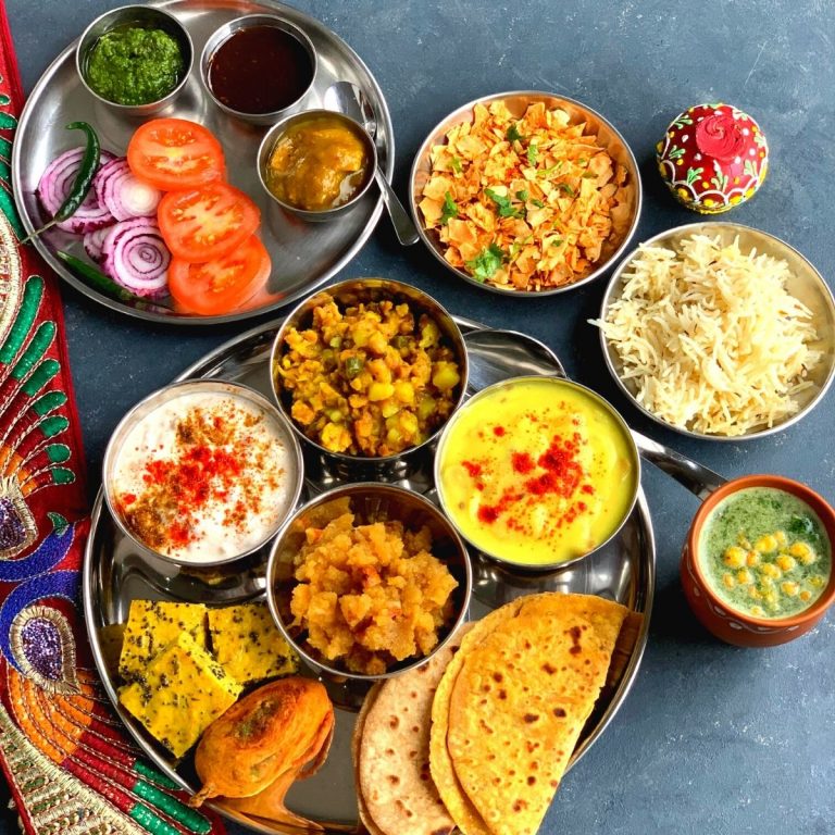 This Rajasthani Thali is a delicious thali made from pantry staple or cupboard ingredients and features Papad ki Kadhi, Mangodi ki sabji, Aam ki Launji etc.