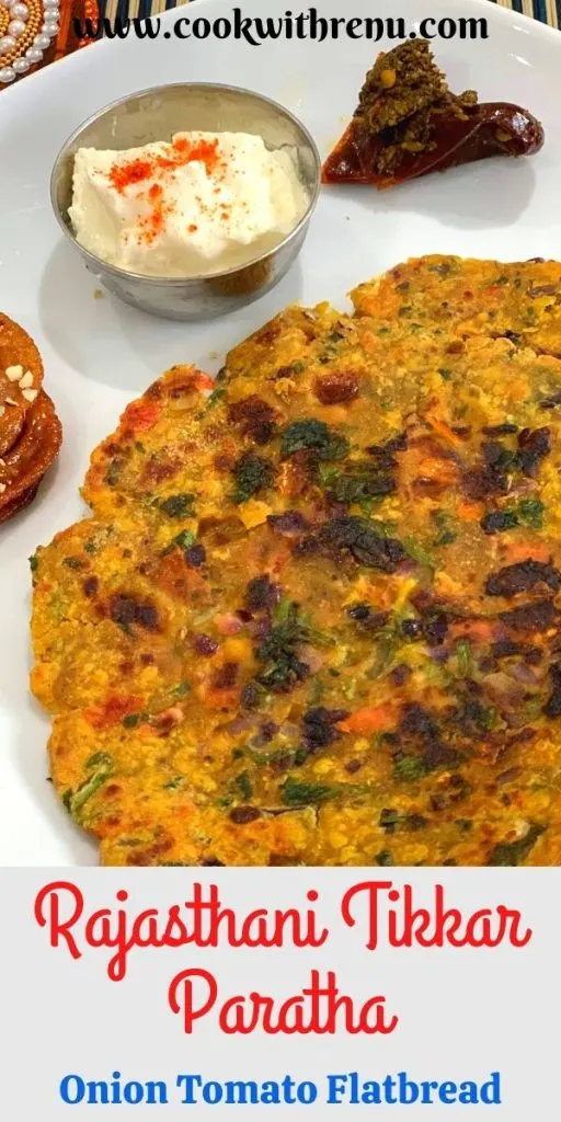 Rajasthani Tikkar Paratha or Pyaaz Tamatar Tikkar is a delicious Indian flatbread made using a combination of flours, spices along with tomatoes and onion.