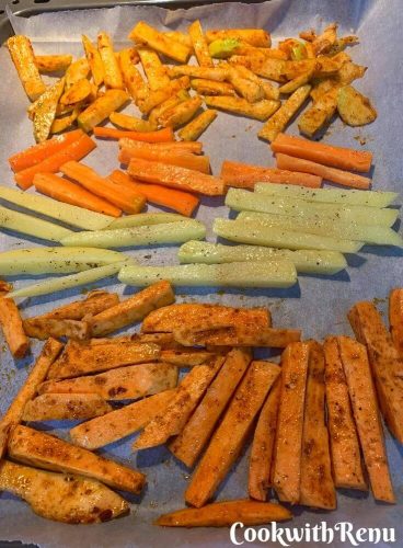 4 different chips, Turnip, Sweet Potato, Carrot & Potato getting ready to be baked