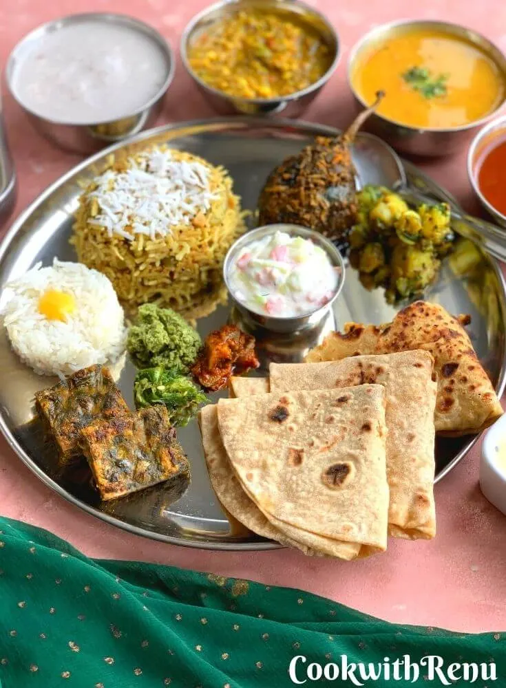 Vegetarian Maharashtrian Thali is a comforting and solu satisfying, balanced meal bursting with spicy and sweet flavours from various dishes.