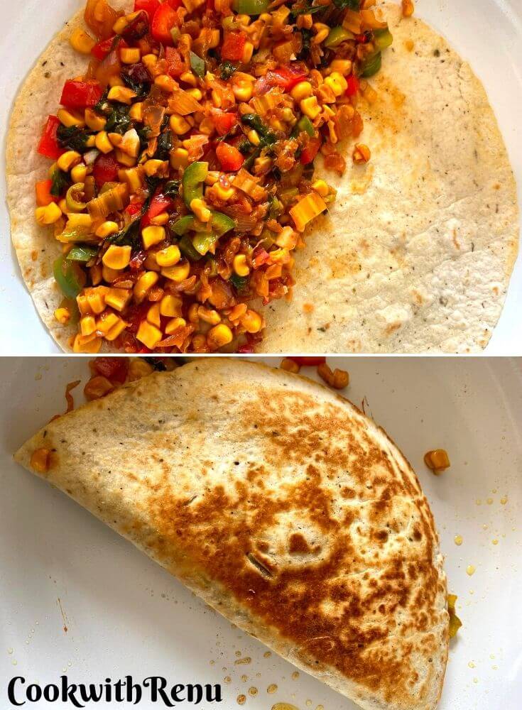 Wrap being filled with the veggies and then folded and cooked