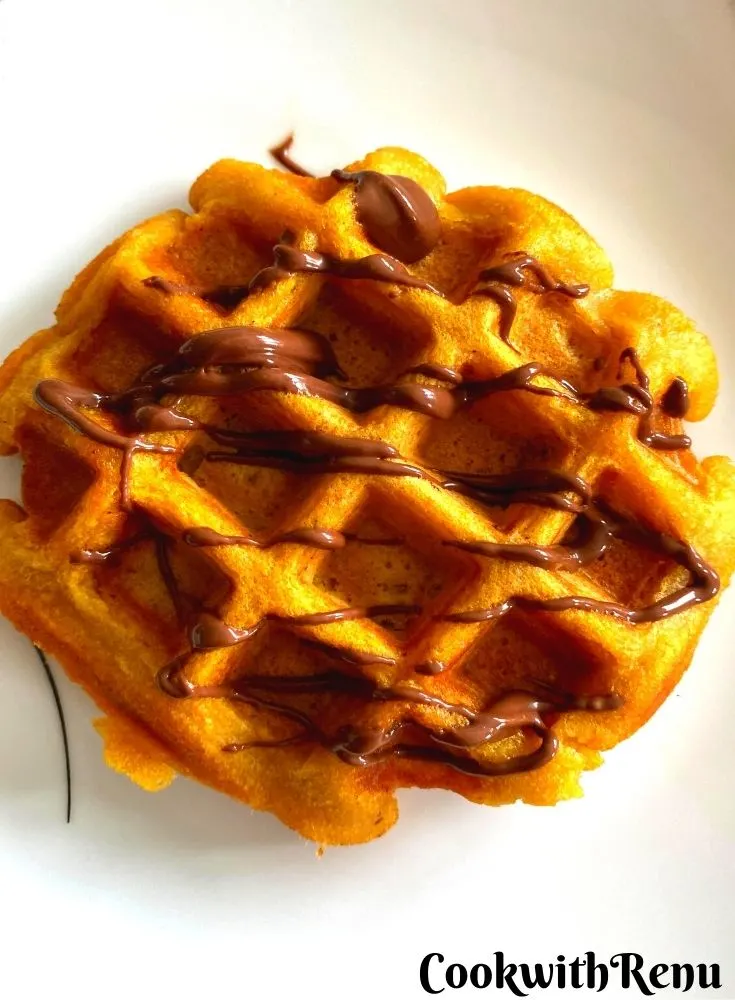 Whole Wheat Pumpkin Waffle Drizzled with some Chocolate