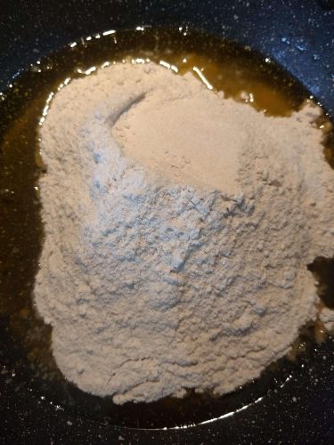 Adding of flour in ghee