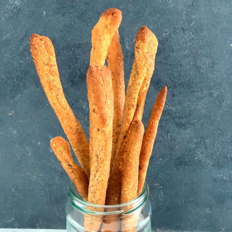 Crunchy Herbed Whole Wheat Breadsticks are deliciously crispy and yummy and perfect with some cheese or chutney or with some hot soup.