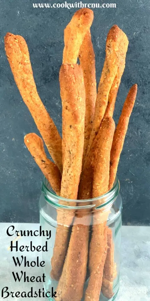 Crunchy Herbed Whole Wheat Breadsticks are deliciously crispy and yummy and perfect with some cheese or chutney or with some hot soup.