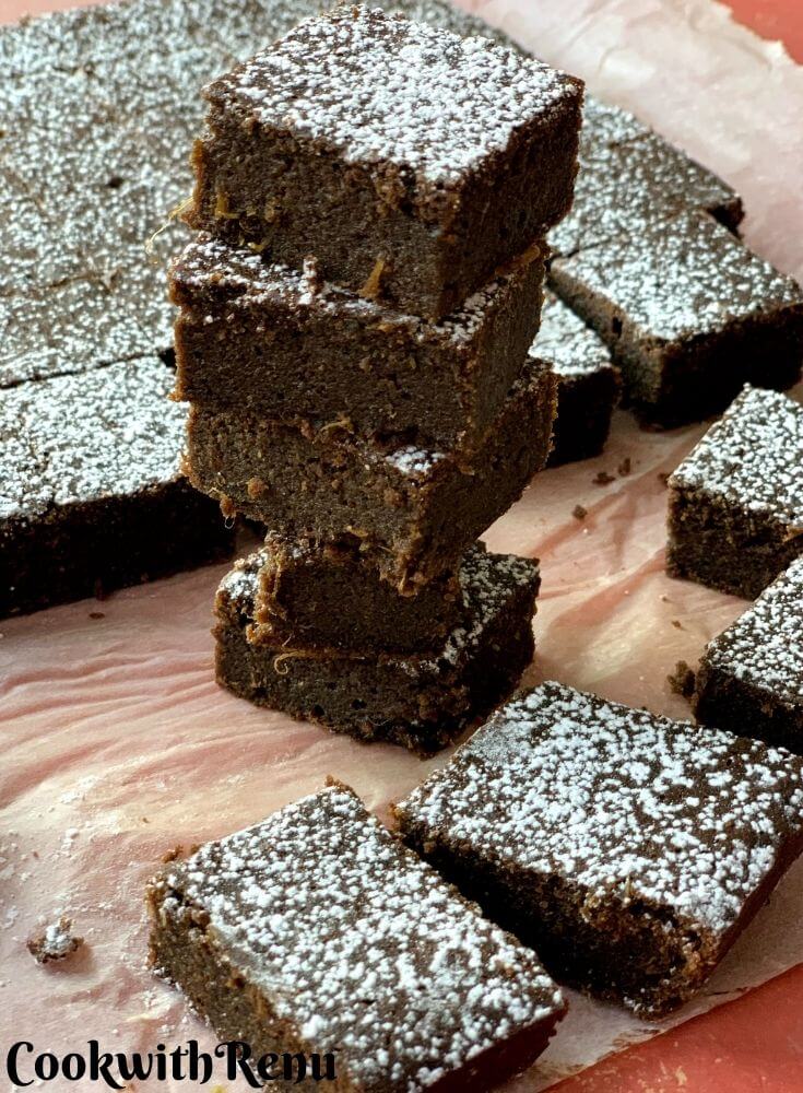 Close up look of kale brownies stacked one above the other