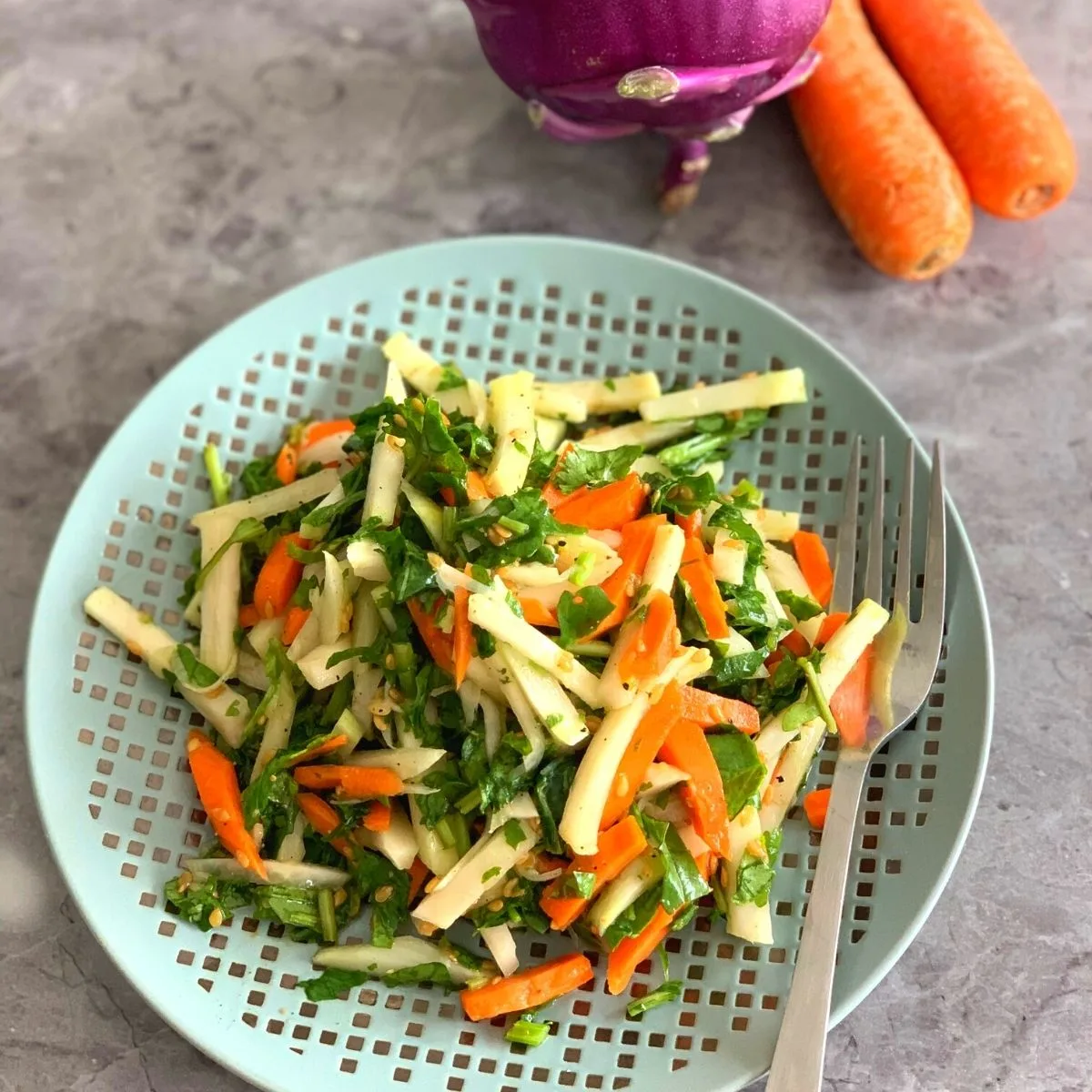Kohlrabi, Carrot, and Spinach Salad is a quick and easy raw salad that can be made with and without oil and goes perfect as a side.